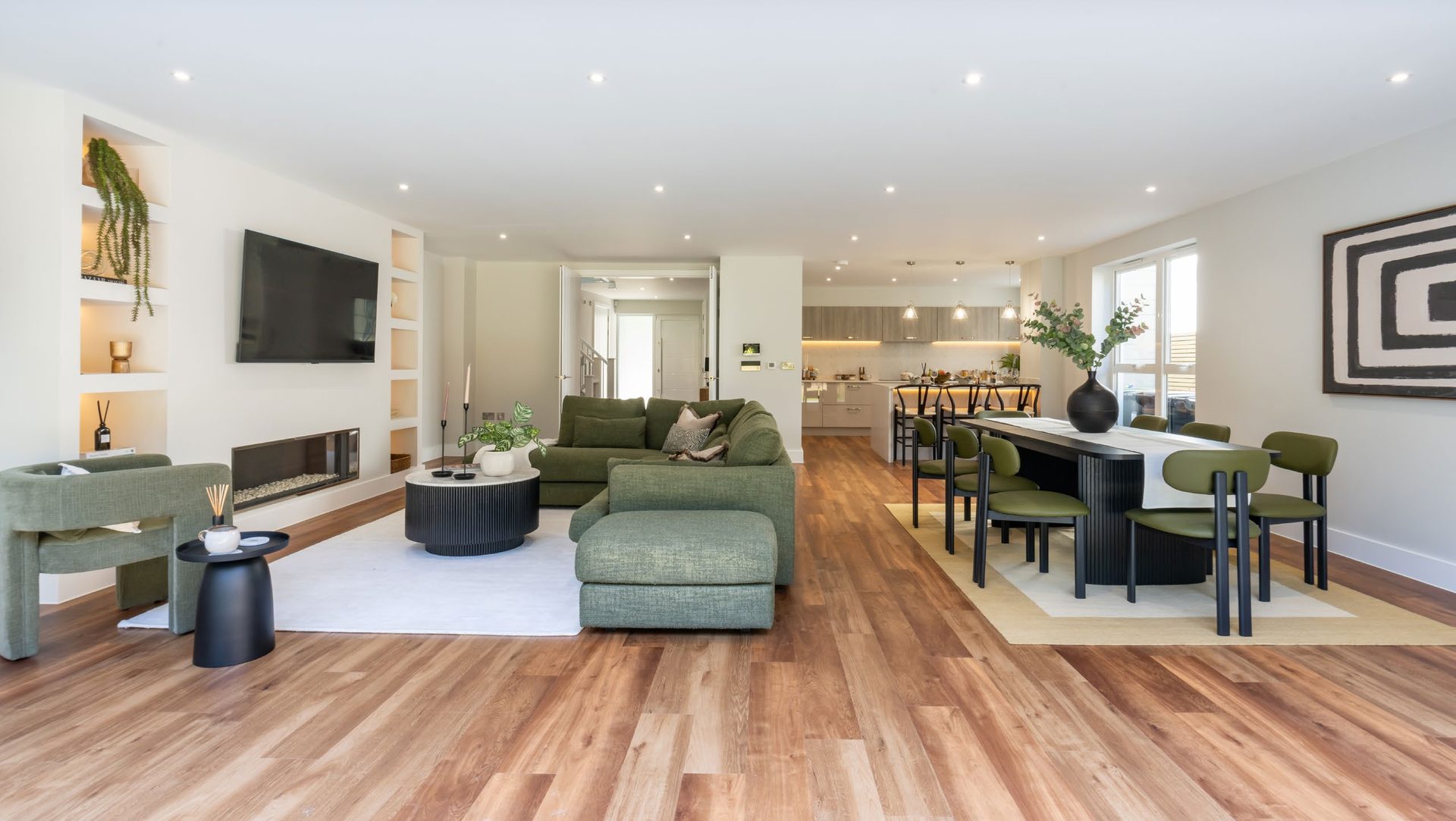 Open-plan living opening to the garden through bi-fold doors