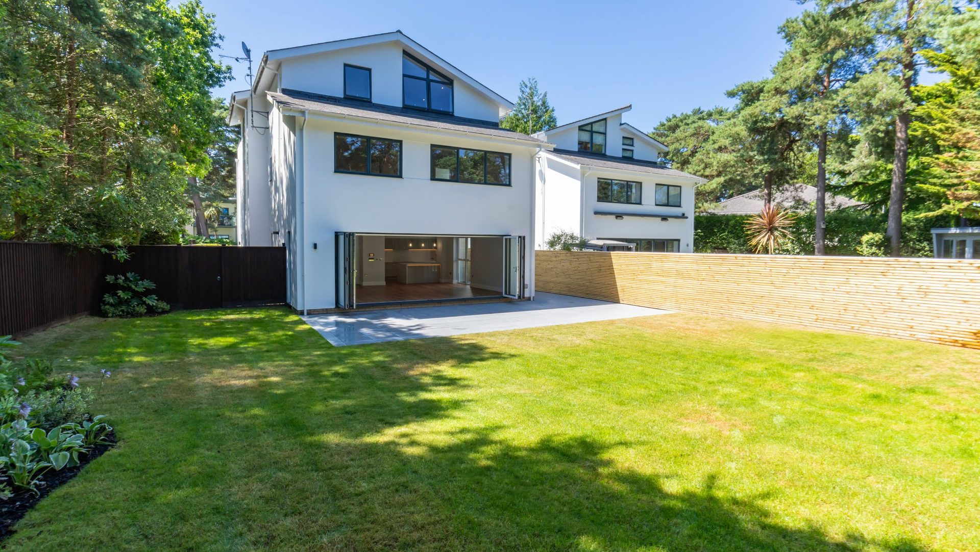 Rear elevation and garden of a Peninsula residence